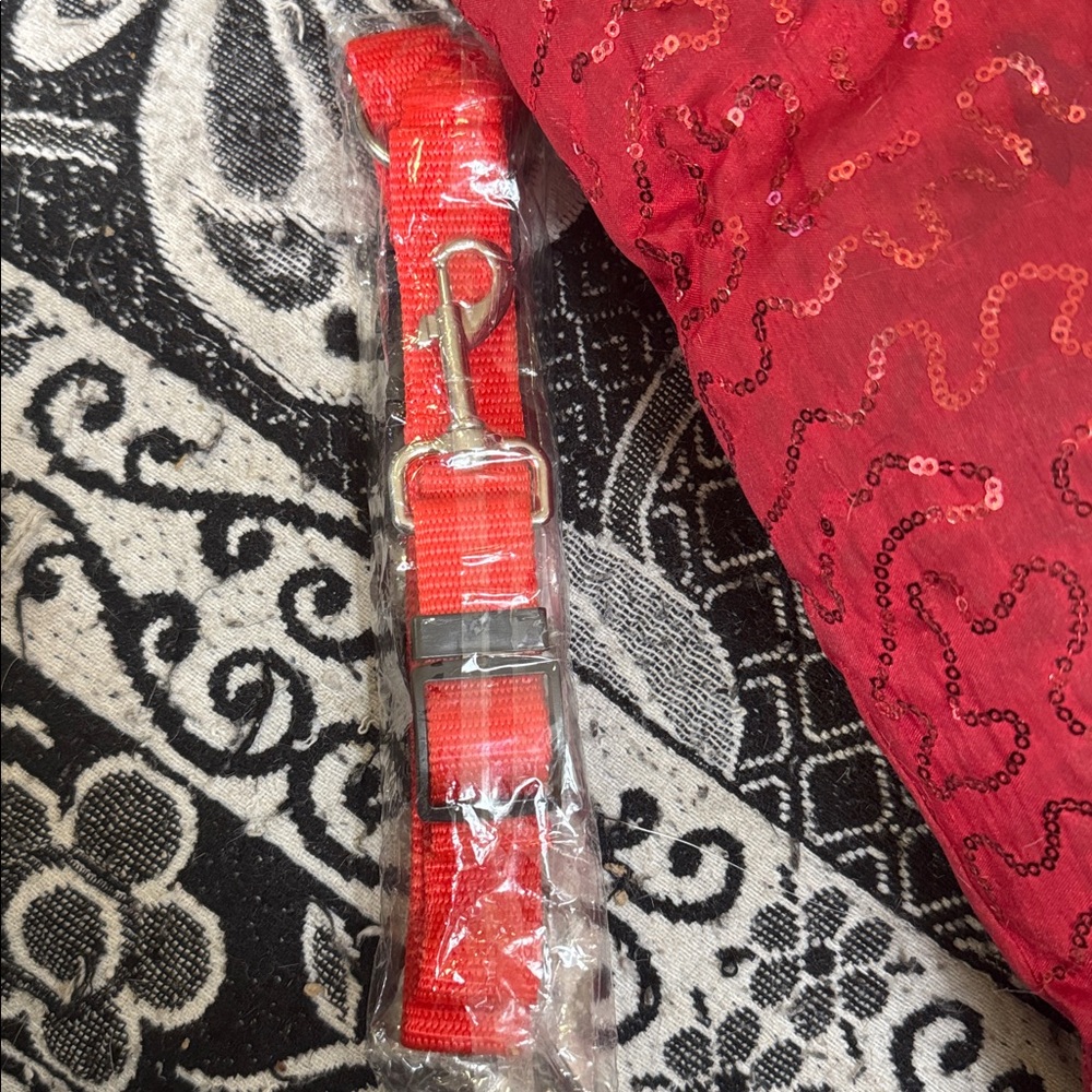 NWT Red Dog Collar and Leash. Never been opened. Has a lot of adjustment pieces.